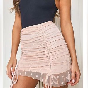 Pink draw string mini skirt